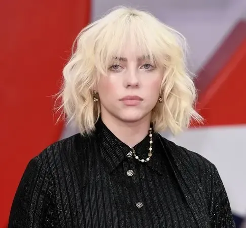 Billie Eilish Shares the Significance of Listening to Fans Sing 'The Greatest' at Live Shows