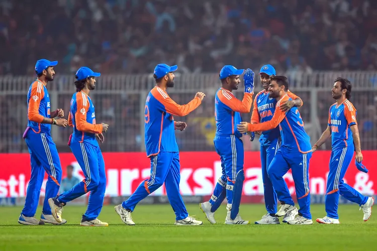 1st T20I: Chakaravarthy claims 3-23 as Indian bowlers restrict England to 132