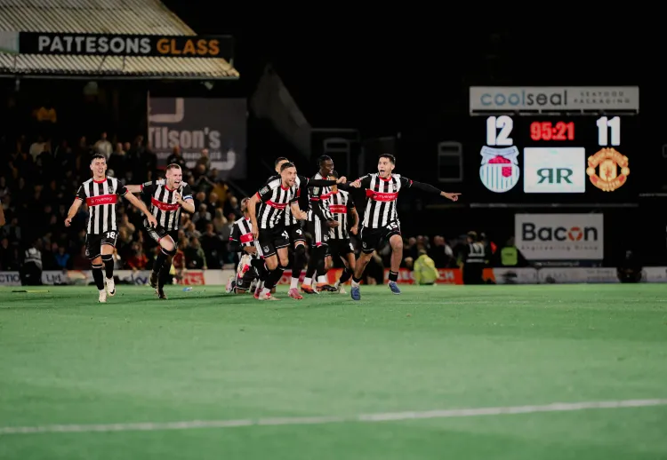 Why Was Grimsby Town Fined for Fielding an Ineligible Player?