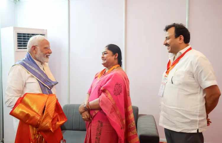 PM Modi Engages with Karnam Malleswari in Yamunanagar, Praises Her Role in Shaping Future Athletes