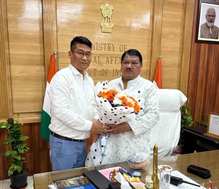 Will Union Minister Oram Support Tribal Development in Tripura?