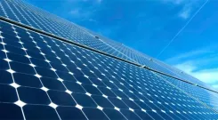 How did Adani Green surpass 15,000 MW of RE capacity to drive India's green resurgence?
