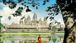 What efforts are being made to restore the ninth brick tower of Bakong temple in Cambodia's Angkor Park?