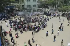 Why are students in Bangladesh demanding the Environmental Advisor's resignation?