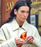 Dua Lipa flaunts engagement ring as she runs errands in London