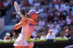 French Open: Swiatek survives second-set scare to extend reign to 24 wins