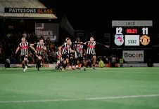 Why Was Grimsby Town Fined for Fielding an Ineligible Player?
