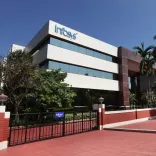 Did Infosys’ Q1 net profit decline sequentially to Rs 6,924 crore while revenue increased?