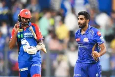 IPL 25: Santner, Bumrah, Surya star as MI storm into playoffs with a 59-run win over DC (Ld)