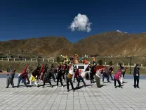 How Are Kailash Manasarovar Yatra Pilgrims Celebrating International Day of Yoga in Tibet?
