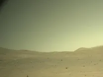 How Do Dust and Water Ice Affect the Martian Atmosphere?