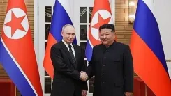 Will North Korea's Kim Stand 'Side by Side' with Xi and Putin at China's Military Parade?