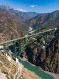 Did Adani Cement Play a Key Role in the Chenab Railway Bridge's Structure?
