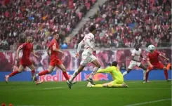 Poulsen’s stoppage-time equaliser delays Bayern’s title celebration as Leipzig rescue 3-3 draw