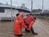 How have torrential rains impacted South Korea?