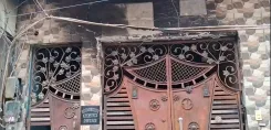 Did a Fire in New Usmanpur Claim a Woman's Life?
